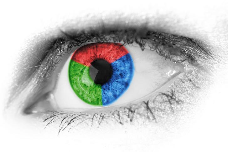 black and white eye with red, blue, and green in the pupil