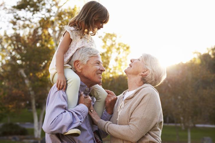 grandparents playing-with-grandchildren-outside