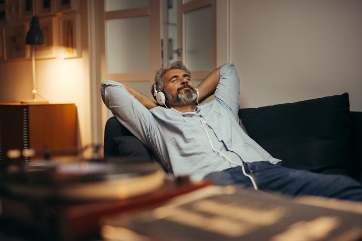 man relaxing-with-headphones
