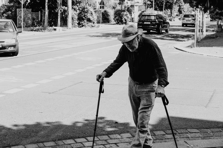 man walking with cane