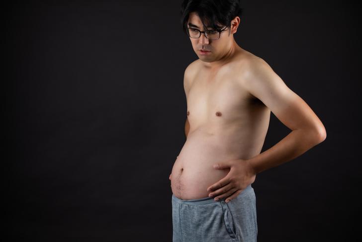man with bloated stomach