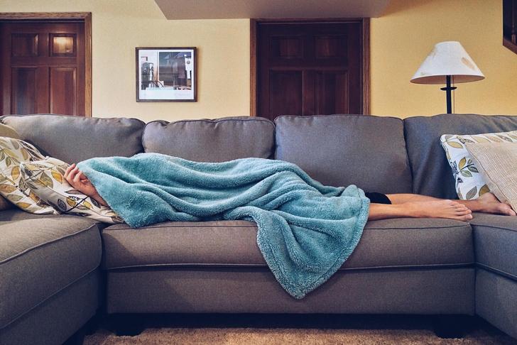 person lying on the couch