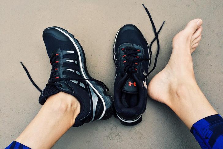 person putting on running shoes