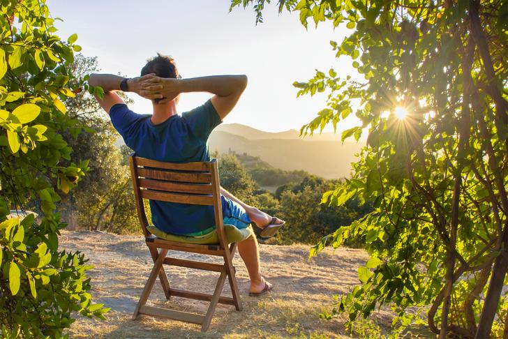 person sitting-in-peaceful-nature