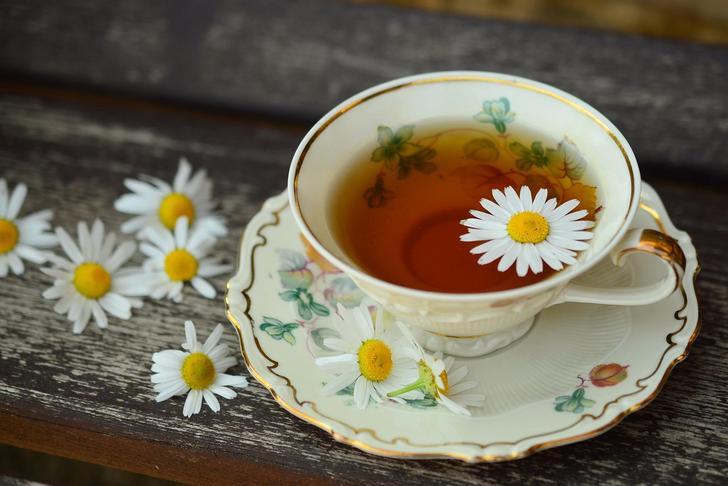 teacup filled with chamomile tea