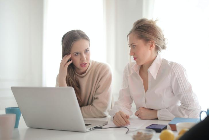 two woman speaking