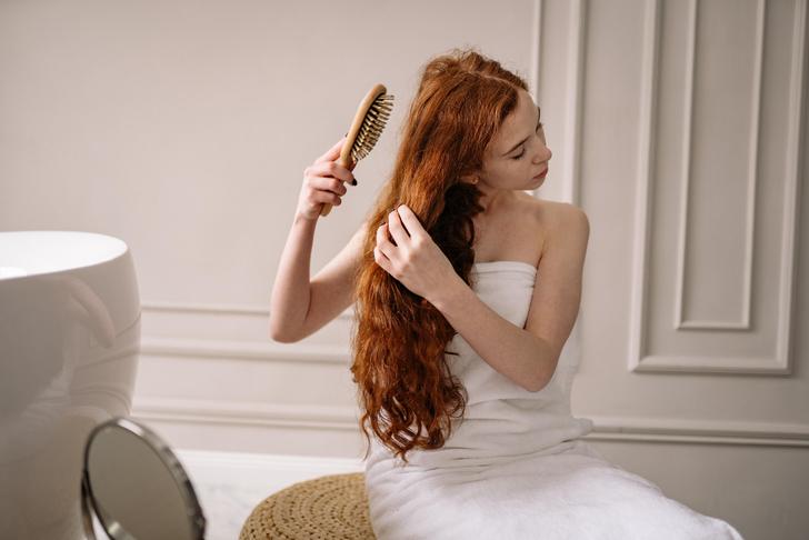 woman brushing hair