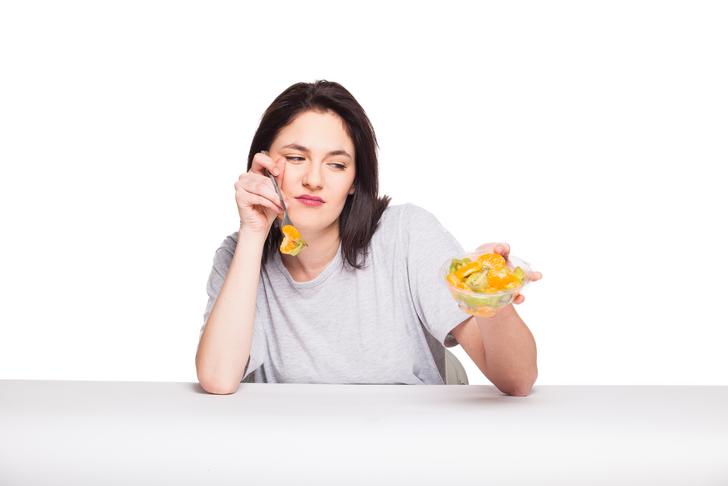 woman playing with her food